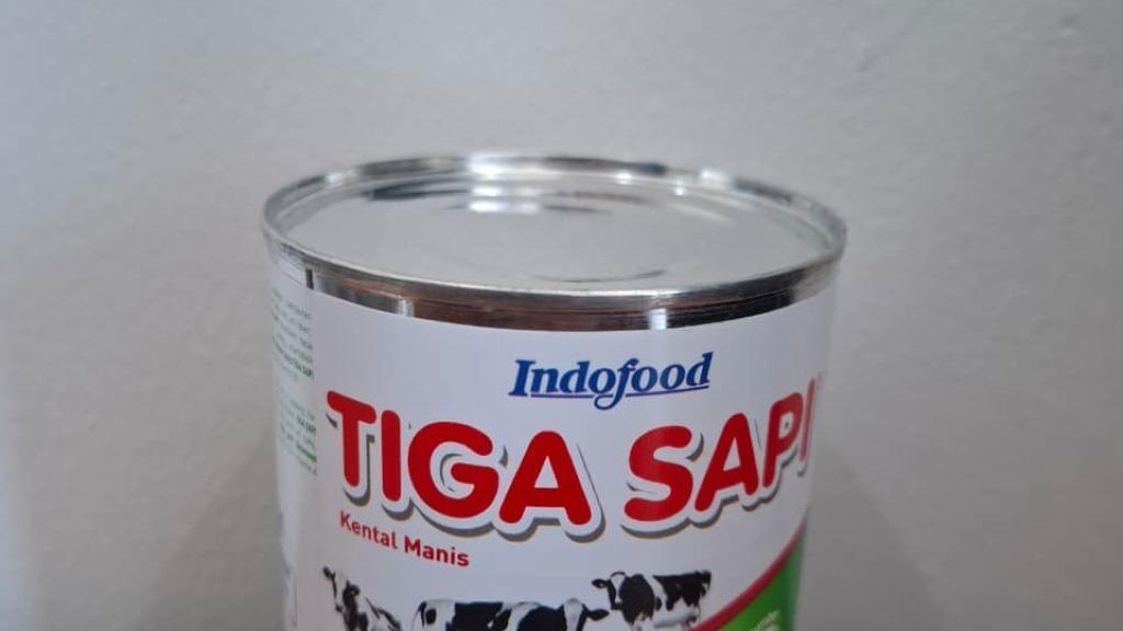 TIGA SAPI KENTAL MANIS